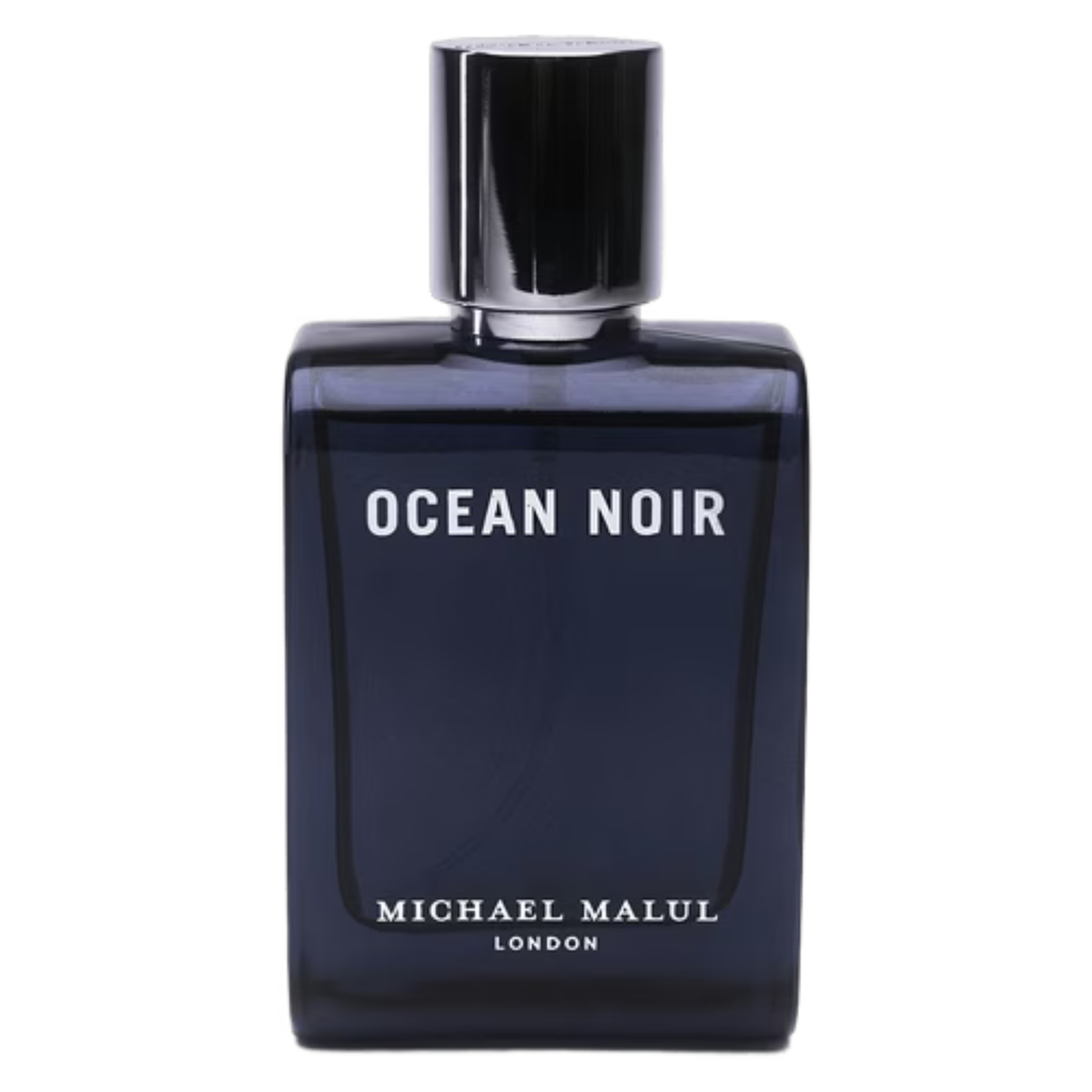 Michael Malul Ocean Noir Eau De Parfum sample bottle with black cap and label, showcasing the fragrance's sleek design.